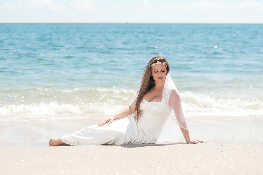 Bride Reclined on the Beach Shore