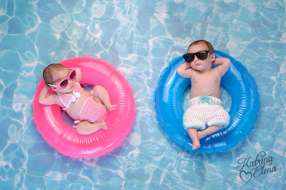 Twin Babies Floating on Swim Rings