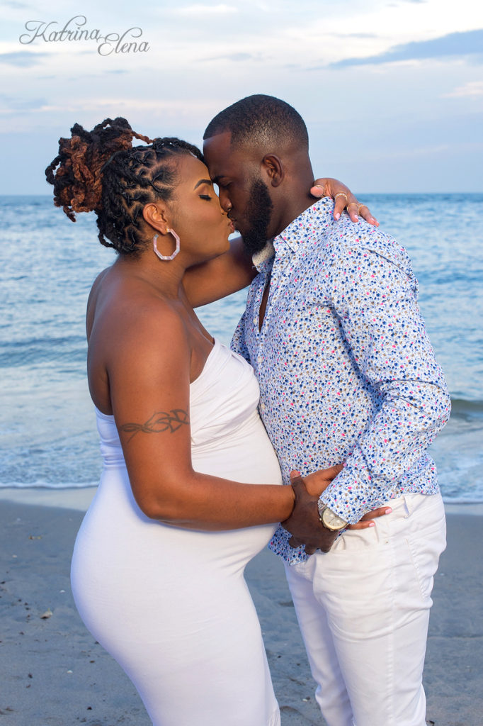 Kissing Pregnant Couple
